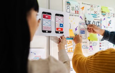 close-up-ux-developer-and-ui-designer-brainstormin-2025-02-18-06-22-57-utc